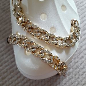 2 crocs chains gold. NWOT